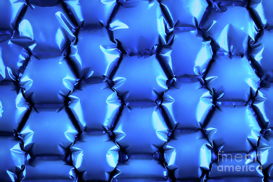 Hexagonal blue bubble textured background Photograph by Simon Bratt