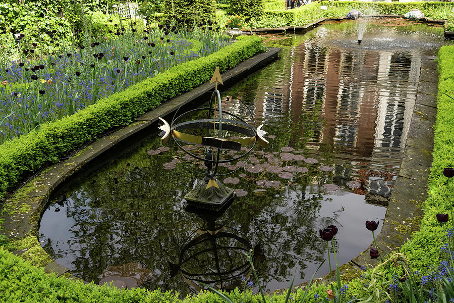 Hidden Tranquility - Beautifully Landscaped Backyard Garden with a Fountain Photograph by Georgia Mizuleva