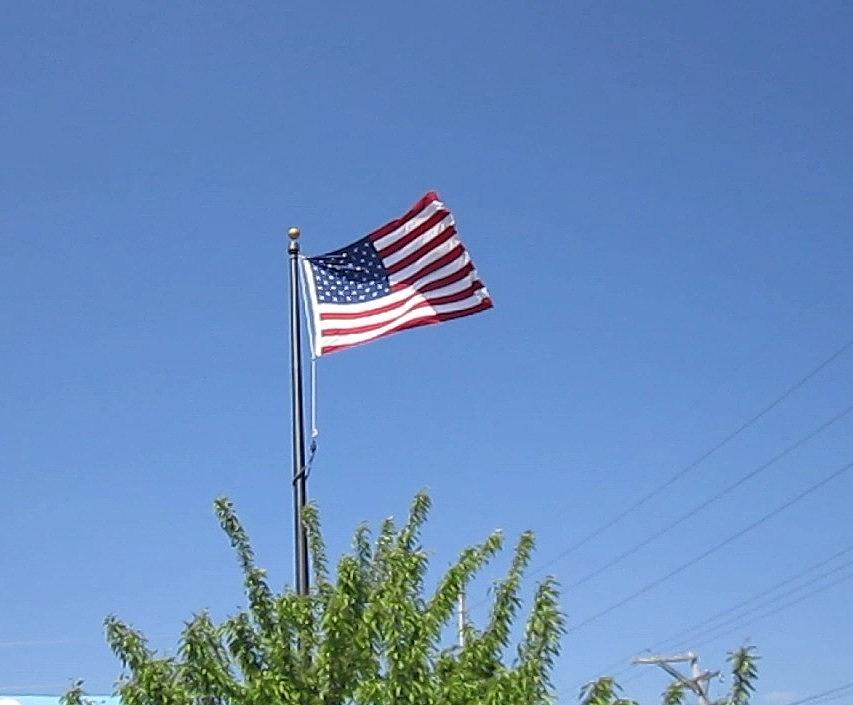 High Flying America Flag Photograph by Glenda Crigger