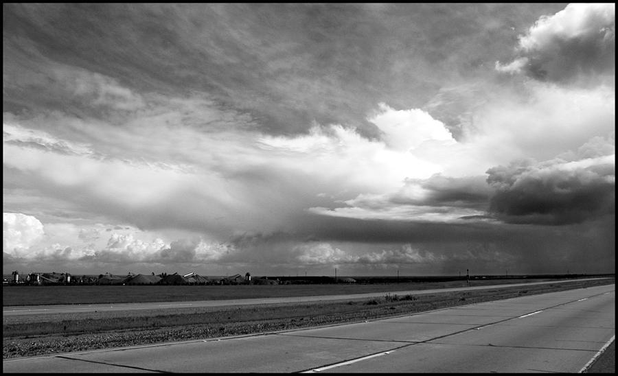 Black And White Photograph - Highway 5 Clouds by John Norman Stewart