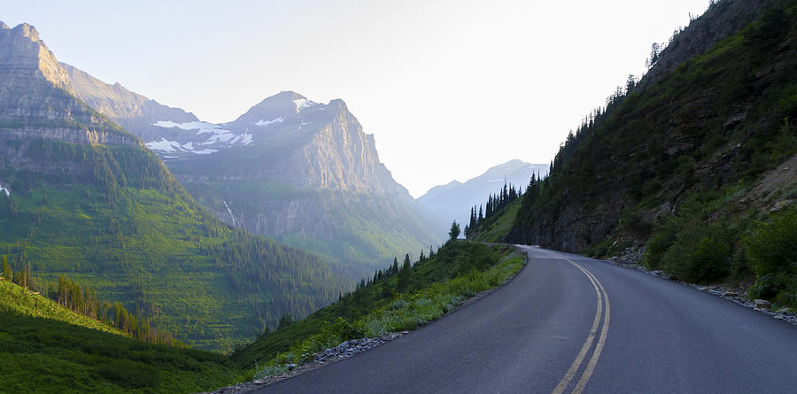 Highway into Glacier National Park Photograph by Lynn Hansen