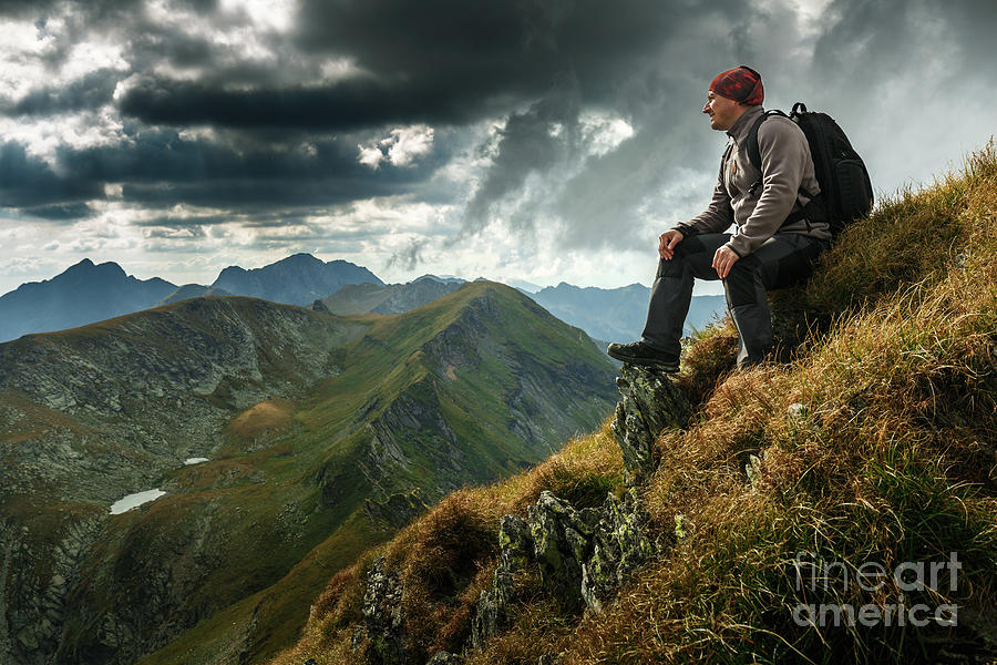Hiker with backpack on mountains Photograph by Ragnar Lothbrok