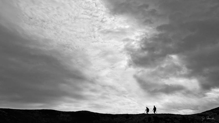 Hikers Under the Clouds Photograph by Joe Bonita