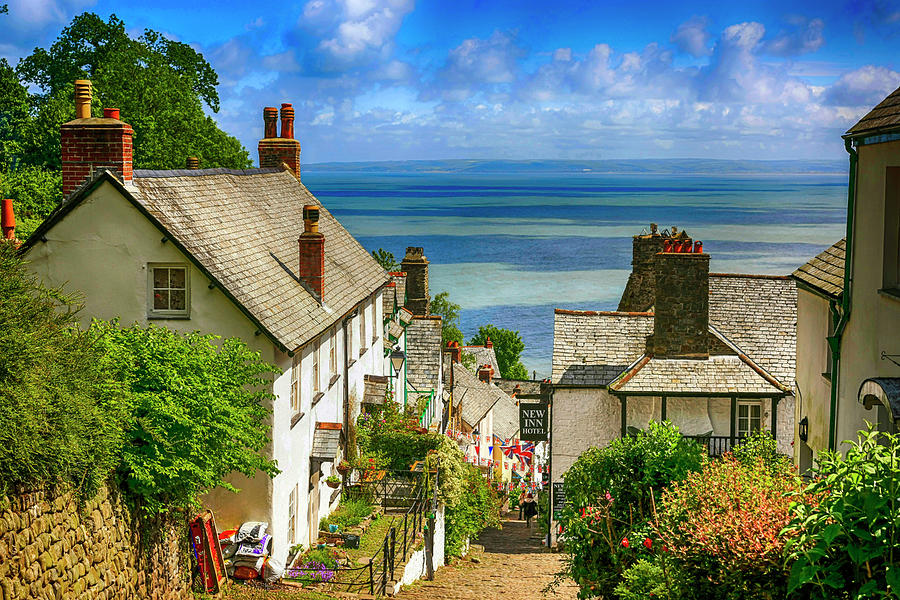 Hillside cottages in Clovelly, UK Photograph by Chris Smith