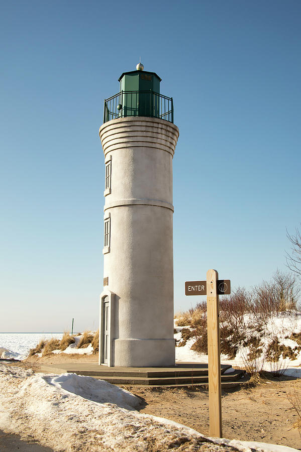 Historic Robert H Manning Lighthouse, Empire, Michigan in winter Photograph by Karen Foley