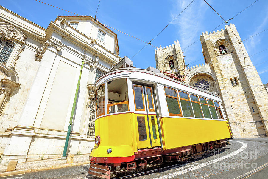 Historic tram and Lisbon Cathedral Photograph by Benny Marty