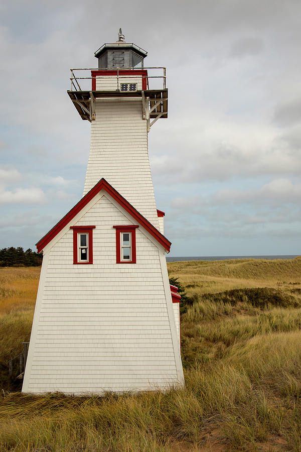 Historic wooden lighthouse, Prince Edward Island, Canada Photograph by Karen Foley