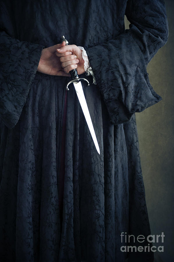 Historical Man In Robes Concealing A Dagger Photograph by Lee Avison