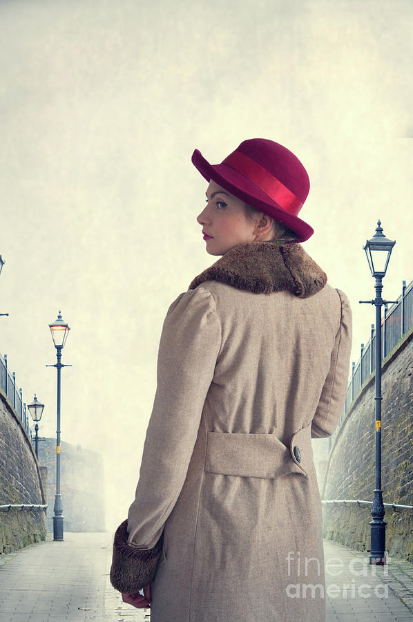 Historical Woman In An Overcoat And Red Hat Photograph by Lee Avison