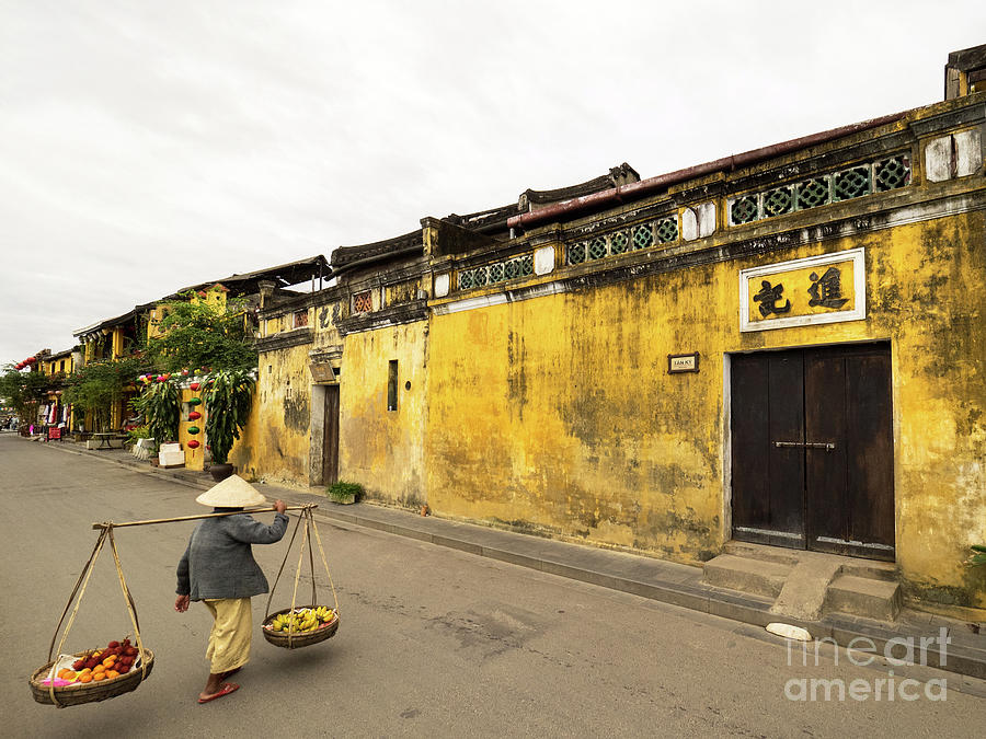 Hoi An Tan Ky Wall Hawker 03 Photograph by Rick Piper Photography