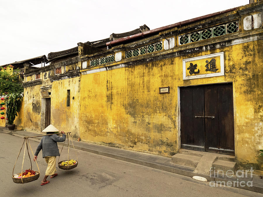 Hoi An Tan Ky Wall Hawker 04 Photograph by Rick Piper Photography