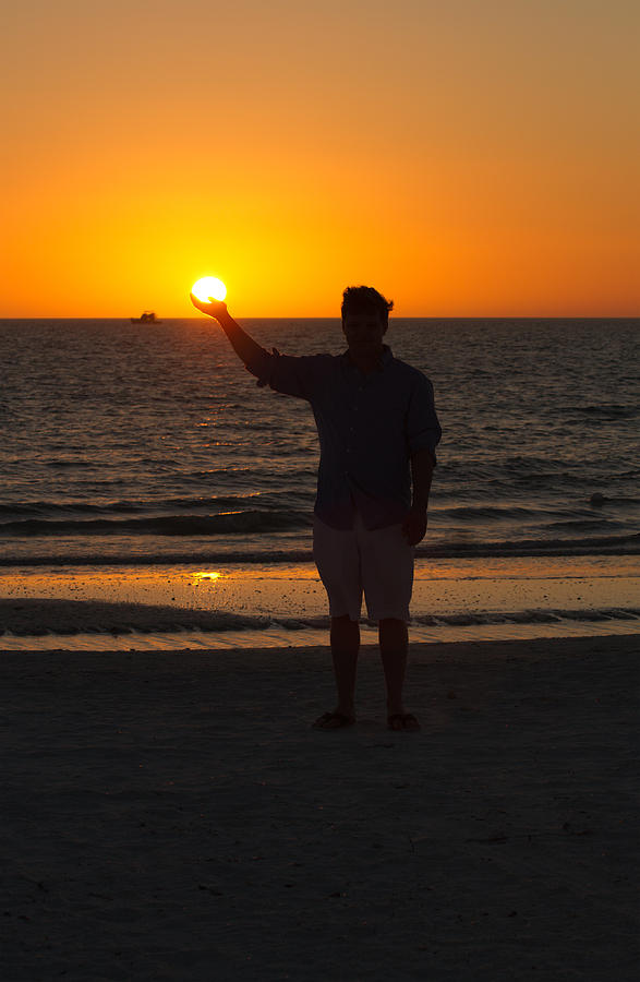 Holding the Sunset Photograph by Toni Thomas