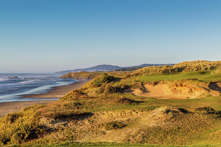Hole 11 at Pacific Dunes Photograph by Mike Centioli