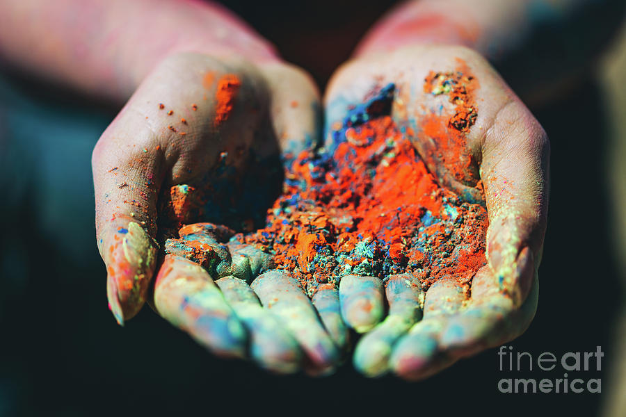 Holi powder held in womans hand. Close-up. Photograph by Michal Bednarek
