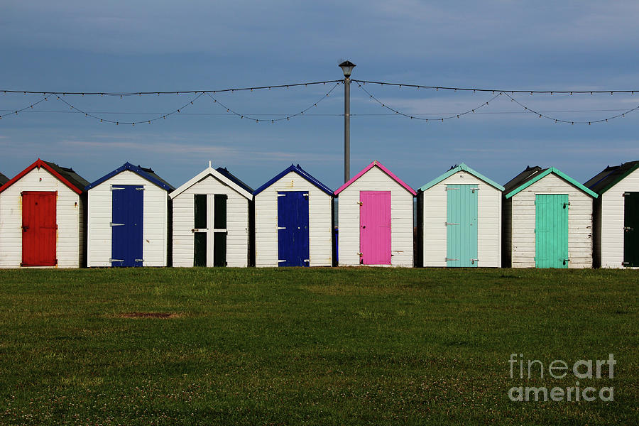 Holiday beach huts Photograph by Tom Conway