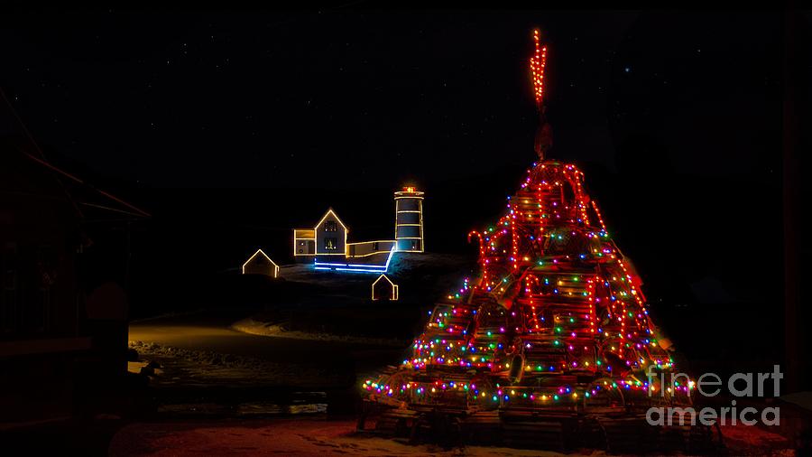 Holiday lights at Cape Neddick/Nubble Light. Photograph by New England Photography
