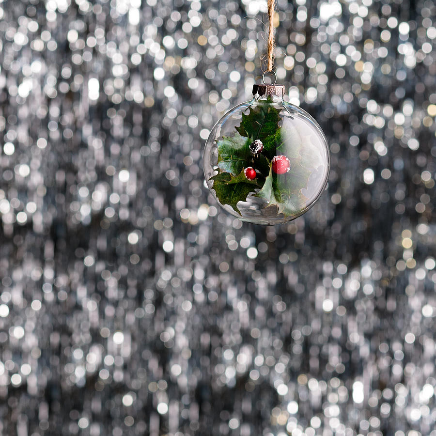 Holly Christmas bauble  Photograph by U Schade