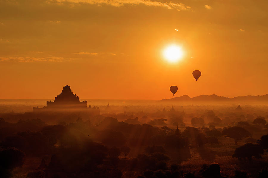 Holy temple and hot air balloons at sunrise Photograph by Pradeep Raja PRINTS