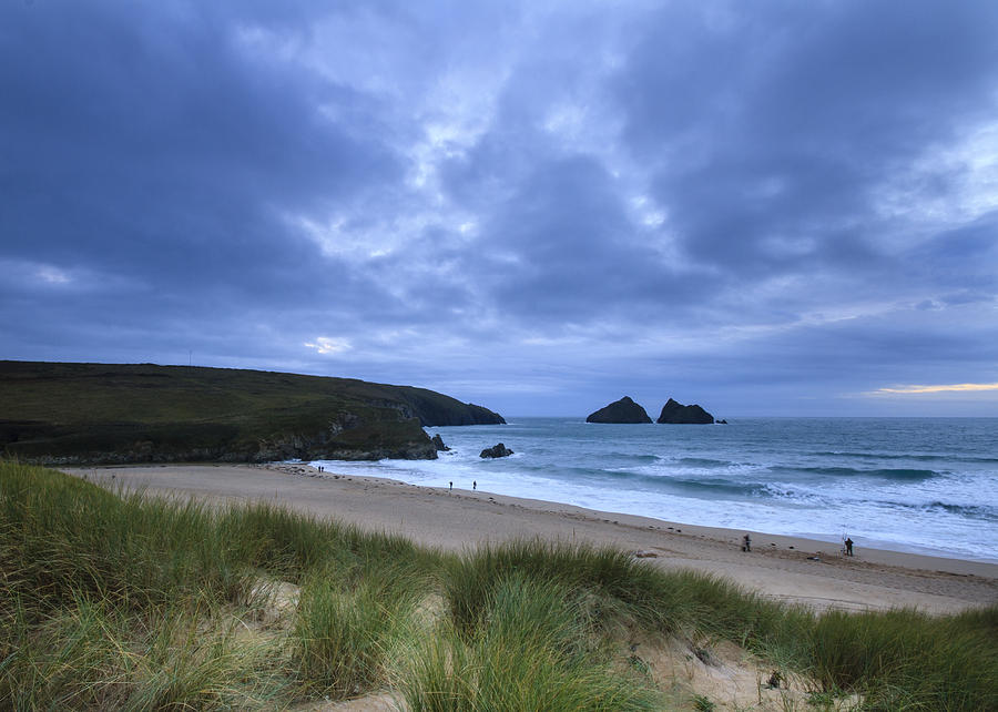 Holywell bay at dusk Photograph by Chris Smith