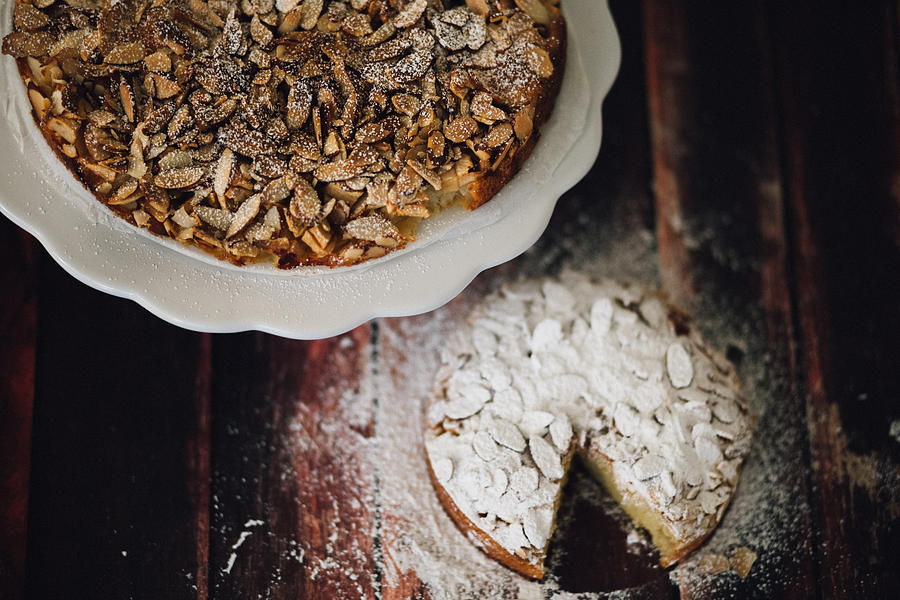 Home made almond cakes on the rustic background Photograph by Aldona Pivoriene