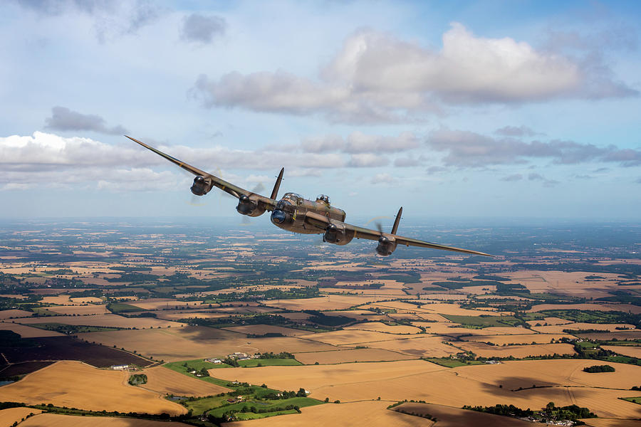 Home stretch Lancaster over England  Photograph by Gary Eason