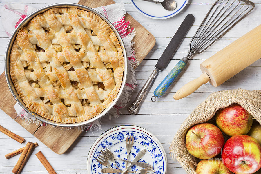 Cake Photograph - Homemade apple pie and ingredients on a rustic table by Sara Winter