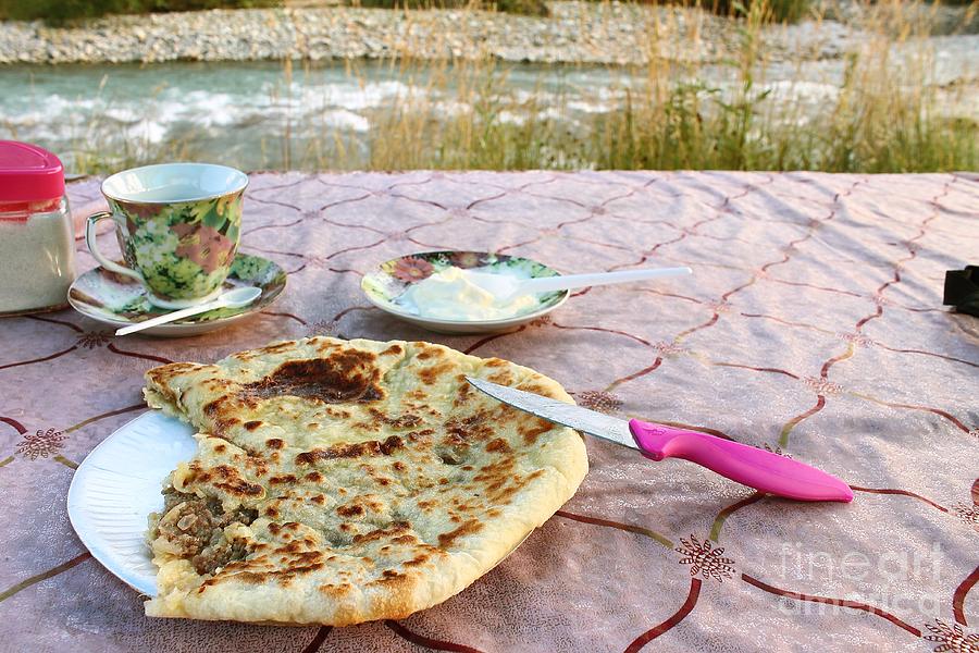 Homemade Food At A Roadside Cafe On The Way To Arkhyz. Hychiny With Meat And Onion With Sour Cream And Tea. Photograph