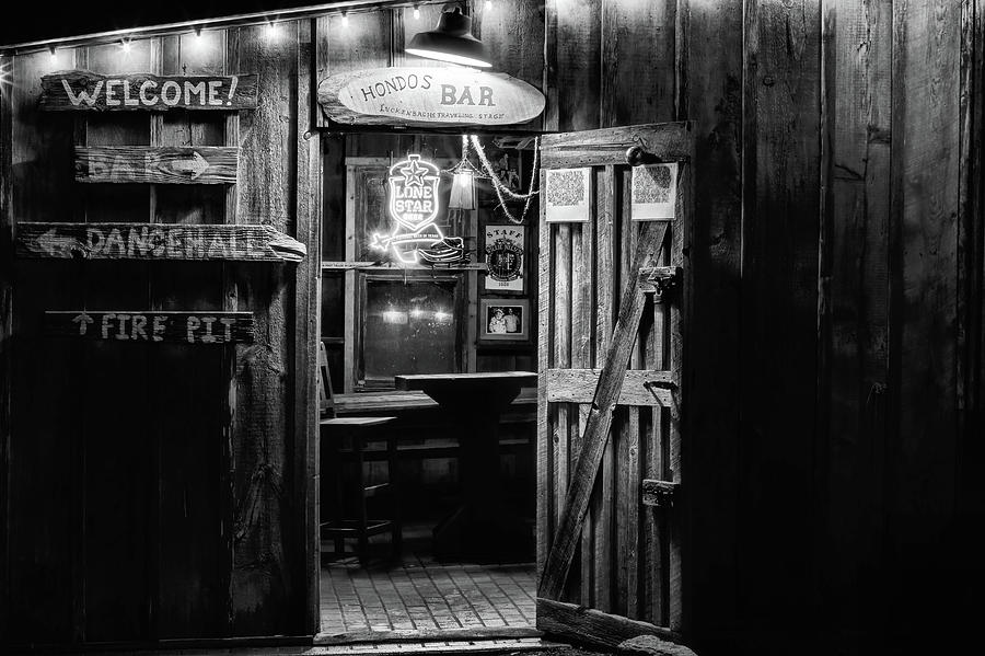 Black And White Photograph - Hondos Bar in Luckenbach Texas by JC Findley