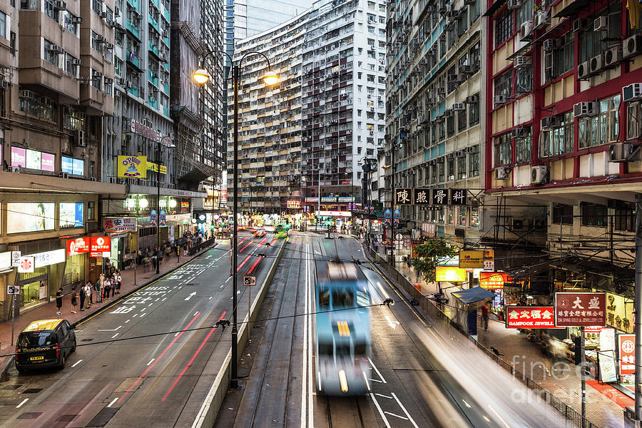 Hong Kong tramway rush Photograph by Didier Marti