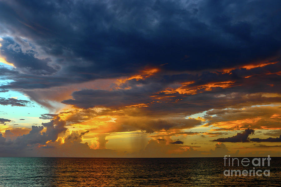 Horizon Rain and Fiery Sky Photograph by Tom Claud