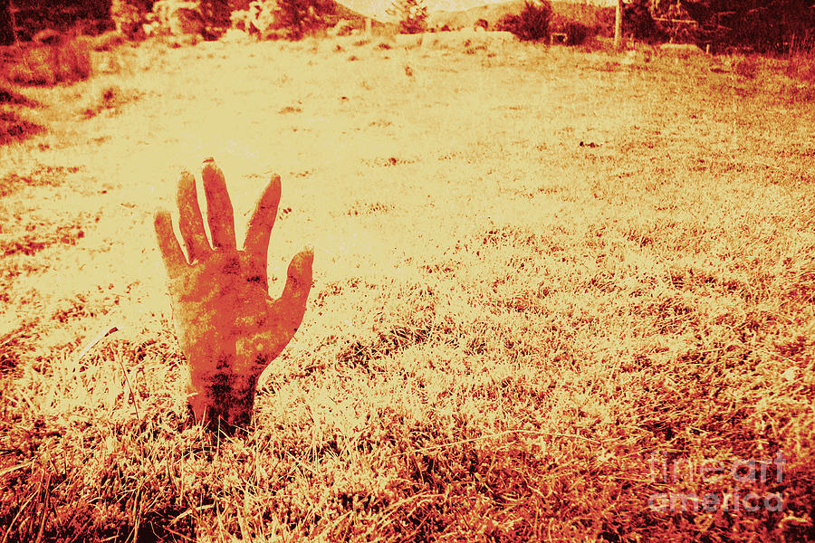 Horror hand of a zombie awakening Photograph by Jorgo Photography