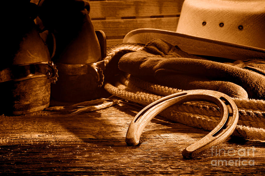 Horseshoe And Cowboy Gear - Sepia Photograph By Olivier Le Queinec 