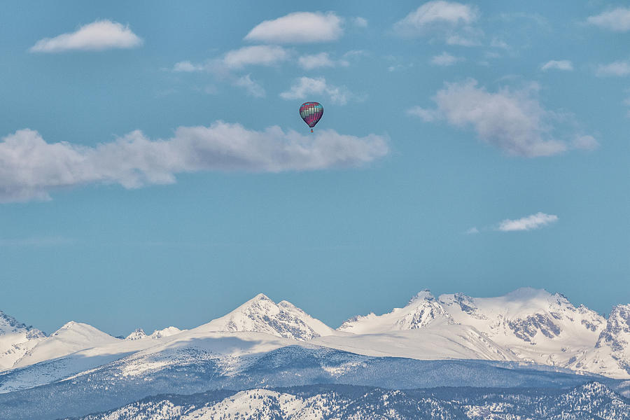 Hot Air Balloon Above Snow-Capped Rocky Mountains Photograph by Tony Hake