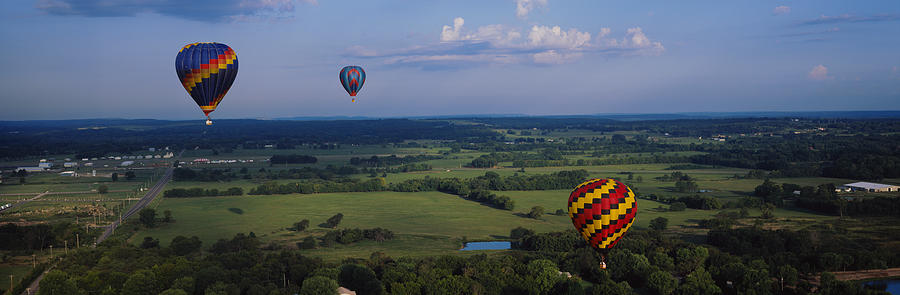 Sports Photograph - Hot Air Balloons Floating In The Sky by Panoramic Images