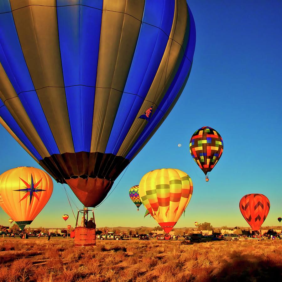 Albuquerque Photograph - Hot Air Balloons Hit A Landing Zone by Zayne Diamond