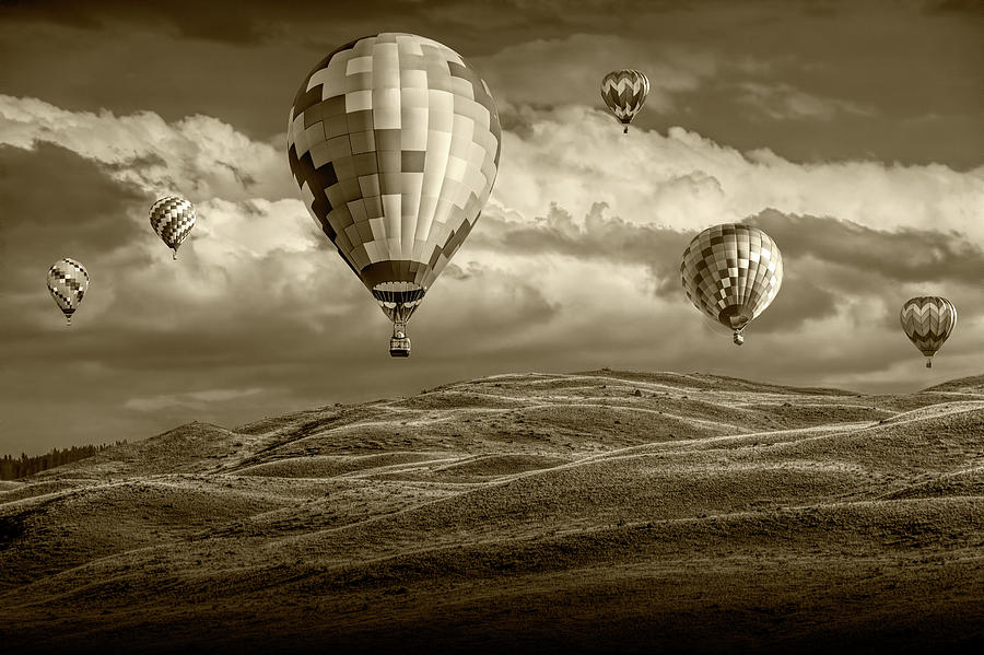 Hot Air Balloons in Sepia Tone over Rolling Hills Photograph by Randall Nyhof