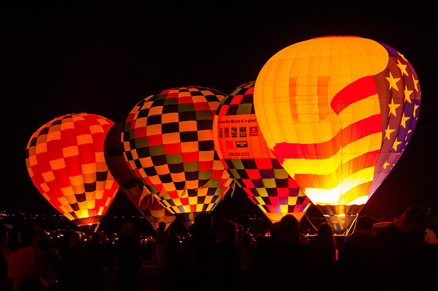 Hot air balloons night glow2 Photograph by Charles McCleanon