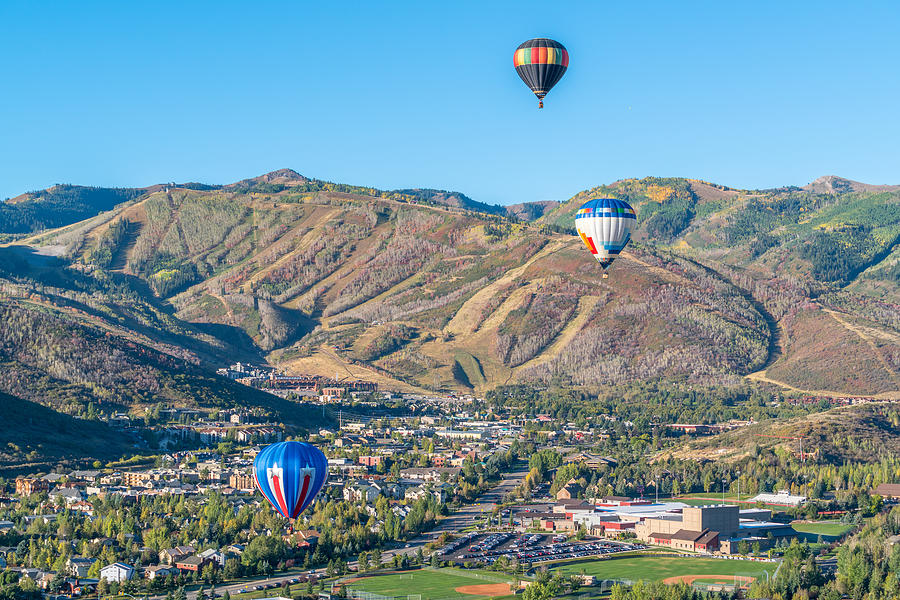 Hot Air Balloons Over Park City in Autumn Photograph by James Udall