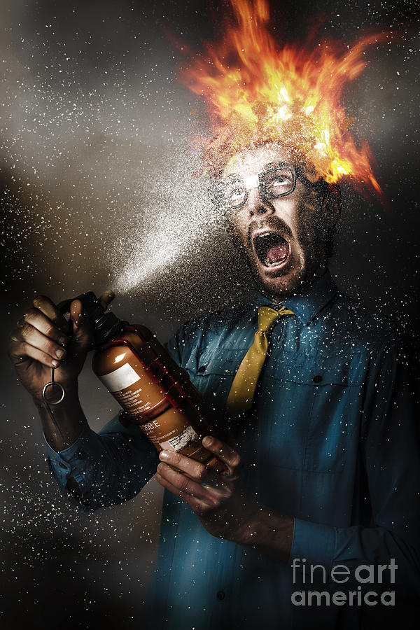 Hot headed nerd businessman playing with fire Photograph by Jorgo Photography