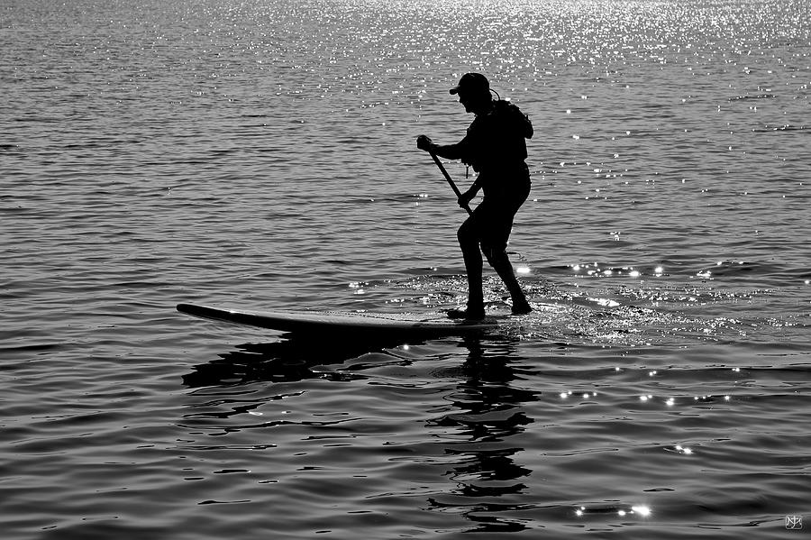 Hot Moves on a SUP Photograph by John Meader