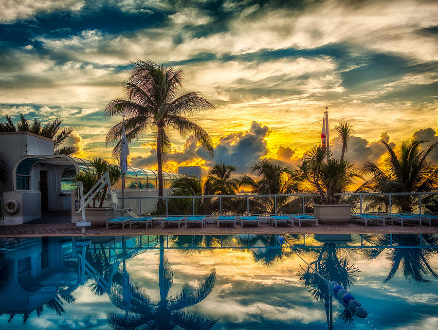 Hotel Pool at Sunrise Photograph by Rikk Flohr