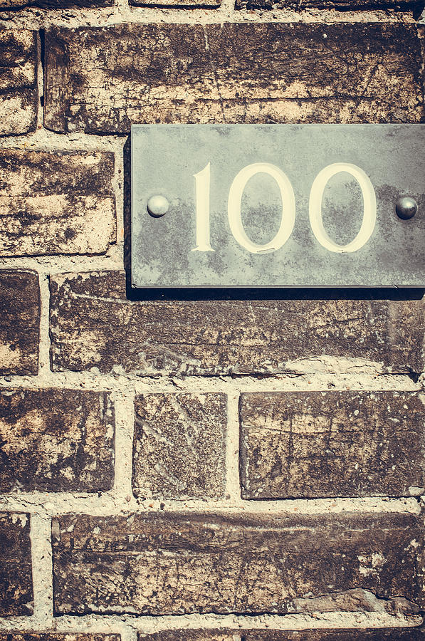 House number hudred on a brick wall. Photograph by Imran Khan | Fine ...