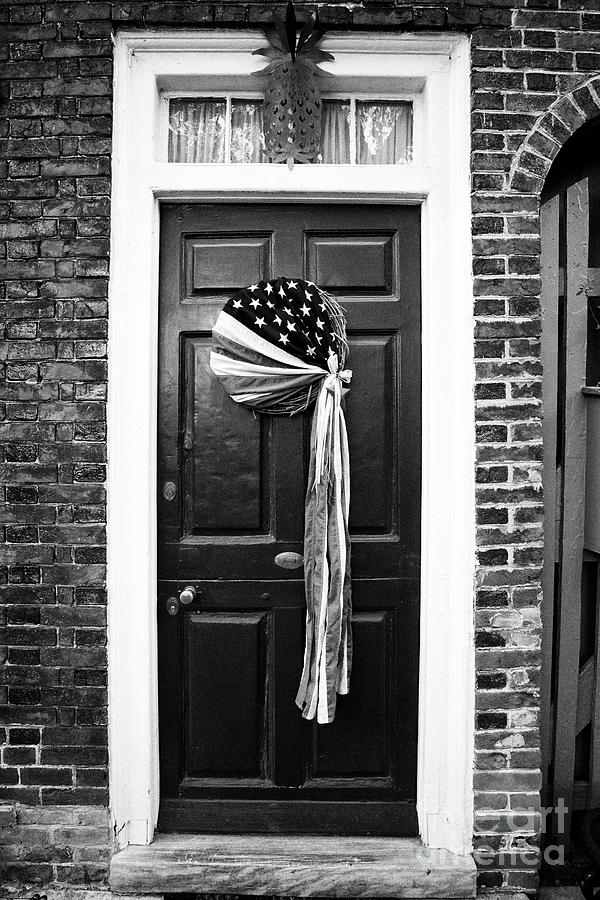 Philadelphia Photograph - house with old us flag wreath elfreths alley in the old city of Philadelphia USA by Joe Fox