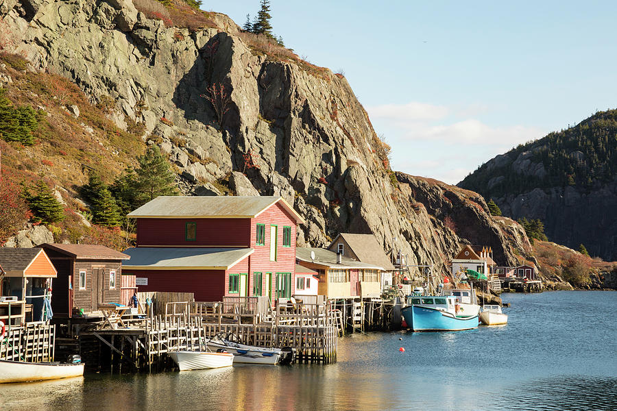 Houses with fishing boats  in historic Quidi Vidi Village, St. J Photograph by Karen Foley