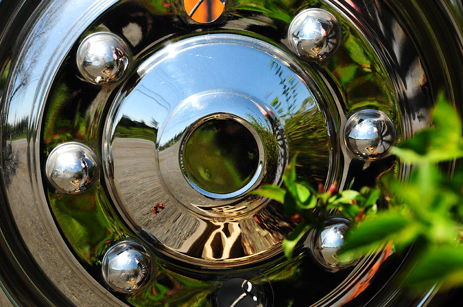 Hubcap Reflection Photograph by JoAnn Lense
