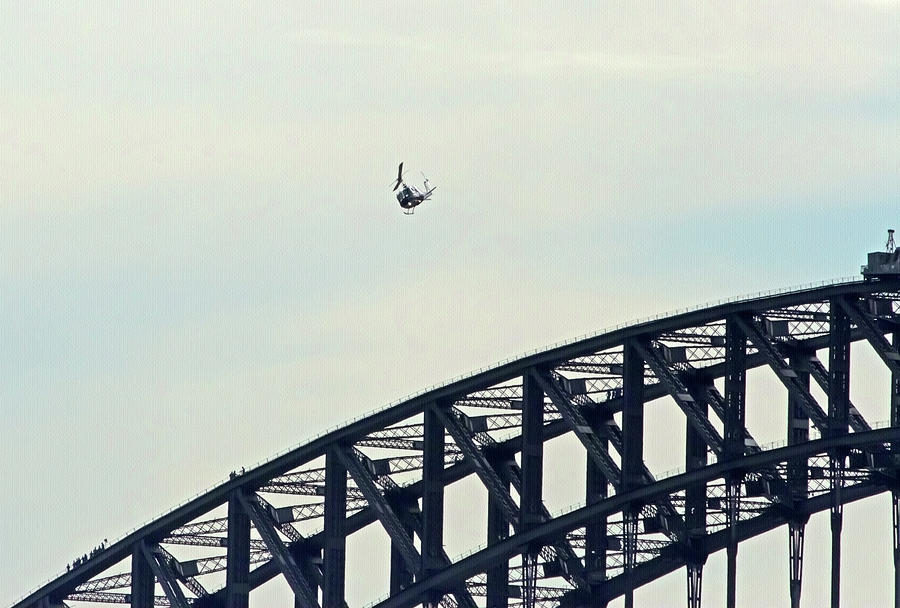 Helicopter Photograph - Huey Flies Over The Harbour Bridge by Miroslava Jurcik