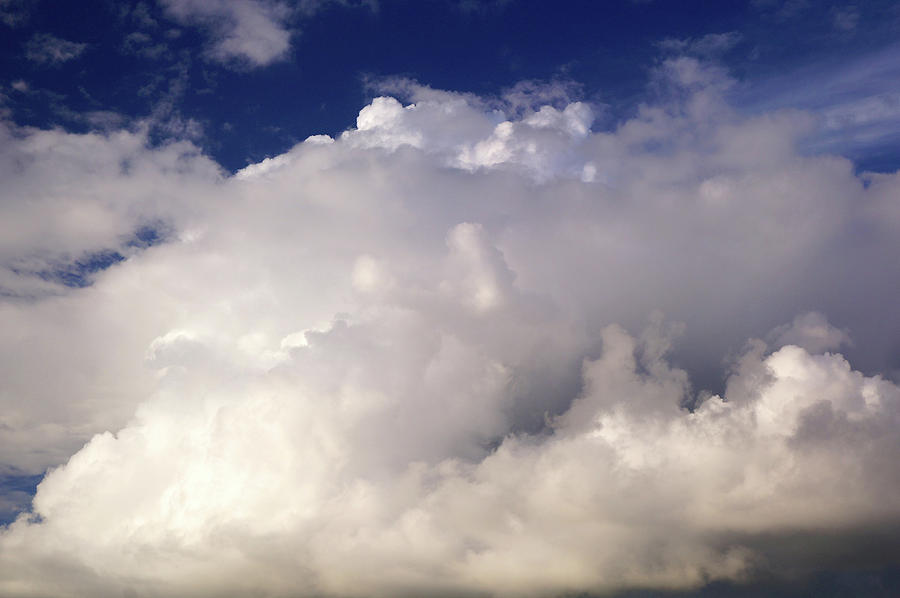 Huge Cumulus Clouds Photograph by Mark Woollacott