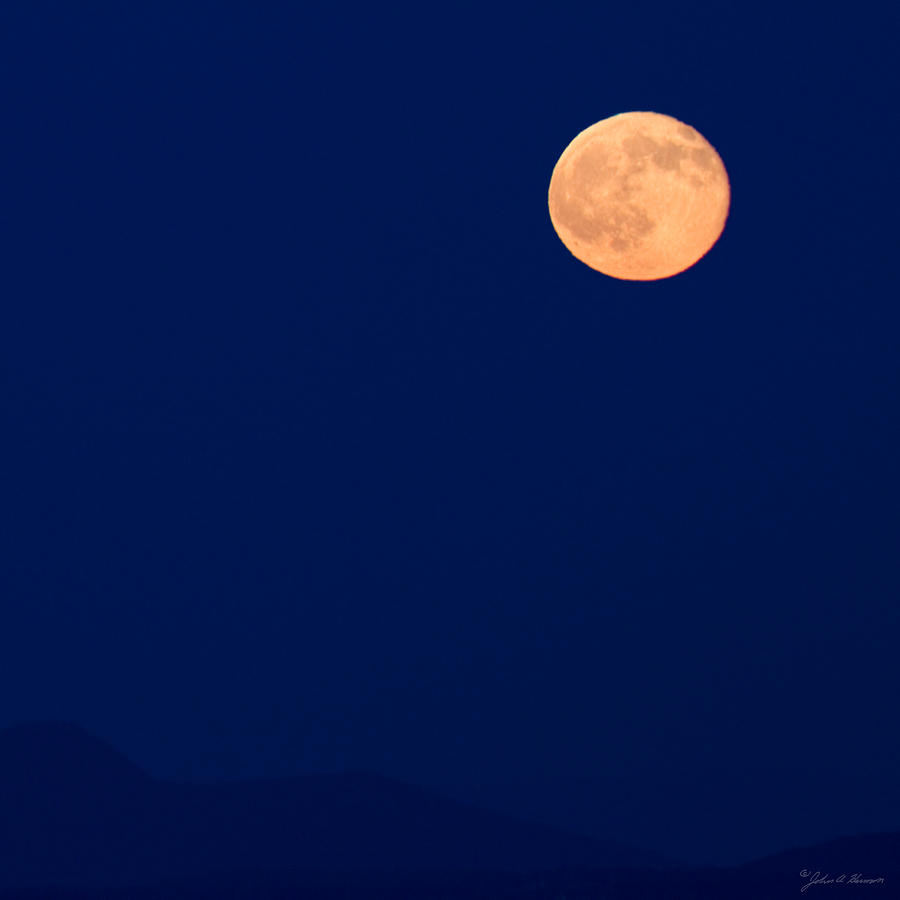 Hunters Moon at Saddleback Mountain Photograph by John Harmon