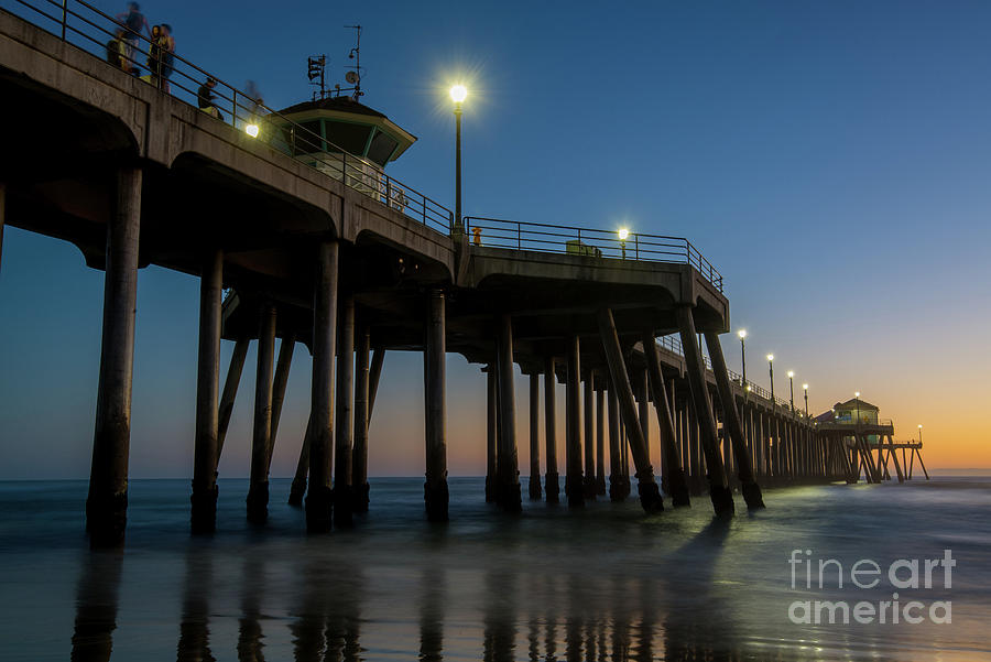 Huntington Beach pier at dusk Photograph by Paul Quinn