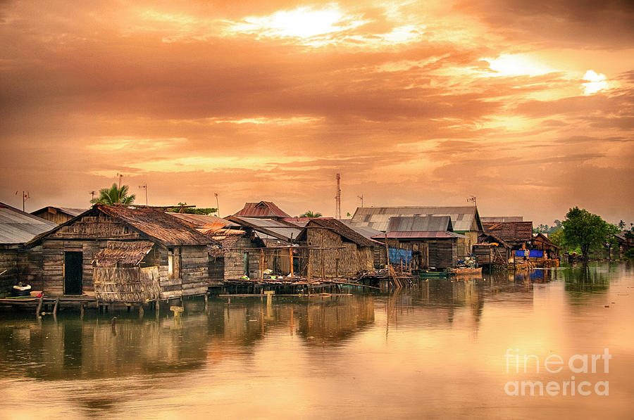 Huts on Water Photograph by Charuhas Images